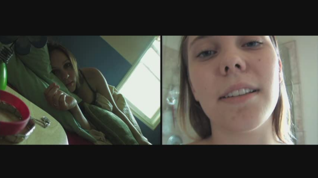 Rachel Quinn (Megan) and Amber Perkins (Amy) in Megan is Missing (2011). A split screen shows Megan and Amy video calling. On the left screen Megan is lying in bed under the covers, and on the right screen Amy is talking to her, holding her camera close to her face.